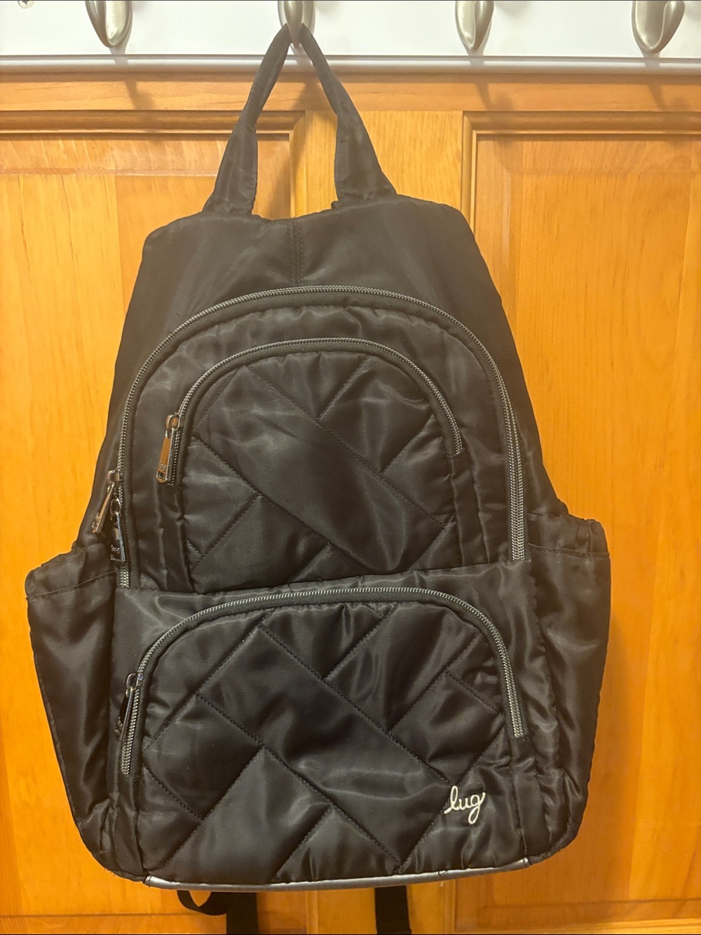 lug Black Quilted Nylon small purse Backpack with Multiple Zip Pockets